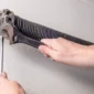 repair a broken garage door spring 1 85x85